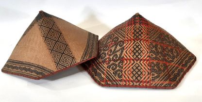 Two early-mid 20th century woven rattan conical hats in Dayak style from Borneo, woven in 2/3