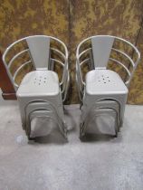 A set of six vintage style sage green painted tubular stacking aluminium chairs with pierced seats