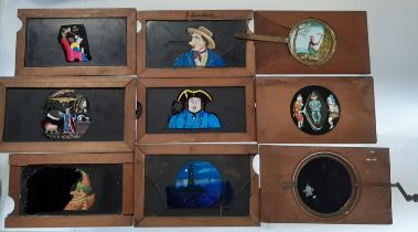 Nine Victorian magic lantern slides, all with moveable action, humorous and others including