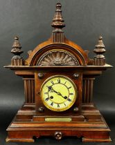 A large Edwardian mahogany architectural cased mantle clock with presentation plaque ‘To Mr A W