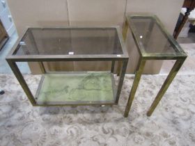 A vintage two tier brass framed glass, topped occasional table, the base decorated with a map of New