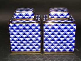 A pair of blue/white and gilded cube tea canisters, a Royal Crown Derby teapot, a small Royal