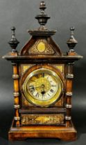 A small late 19th century German mantle clock, architectural form with inlaid case, 42 cm high, 23