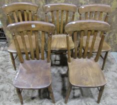 A harlequin set of elm seat lathe back kitchen chairs, with saddle shaped seats