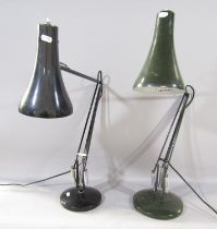 Two Anglepoise type desk lamps, one green, the other black