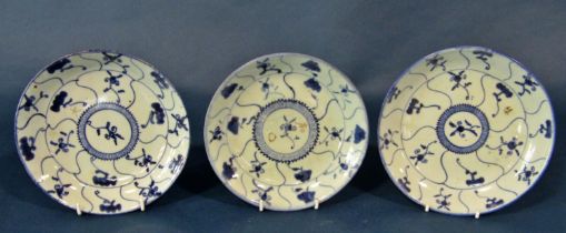 Three late 18th century Chinese export blue and white porcelain plates, each decorated with