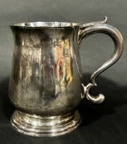 A Channel Islands silver 2 pint baluster tankard with an acanthus scrolled handle, stamped I H of
