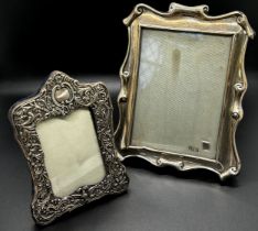 Late Victorian silver scrolled photo frame with blue velvet portrait stand opening 3.5cm x 9.5cm,