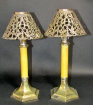 A pair of Gorham silver plated sprung rising candlesticks with filigree shades both stamped Gorham