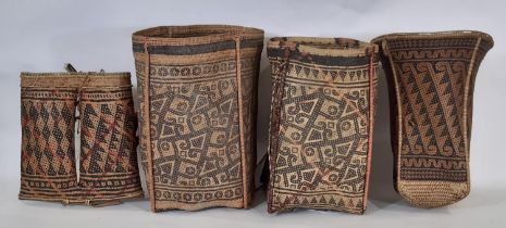 Four pieces of early 20th century basket work from Borneo comprising 2 cylindrical shaped open
