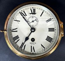 A brass cased Smith Astral ‘bulkhead’ clock, with subsidiary seconds dial, 6’ dial