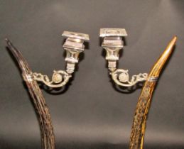 A pair of unusual Victorian antlers mounted on square plinths, with adjustable silver plated