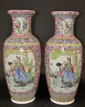 Pair of famille rose vases with character panels, set within repeating floral borders