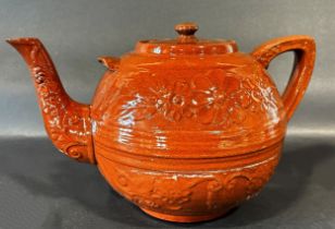 An outsized brown glazed teapot 19th century (af to spout and lid)