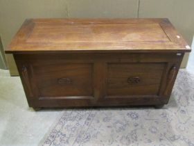 A good quality camphor wood coffer, with hinged cover revealing a divided interior, 53 cm high,