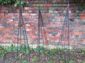 Three coated light steel garden obelisks with arrow head and ball capped finials, 150cm high