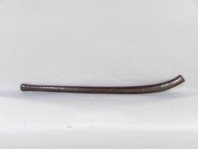 Southsea Island heavy timber war club with curved end, the grip with single carved detail, 88cm long