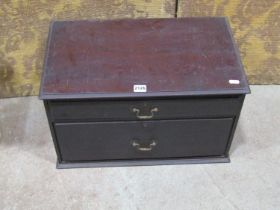 A 19th century mahogany table top two drawer chest, with swan neck handles, 54cm wide x 32cm deep