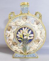 A large impressive Minton ‘Pilgrim’ vase, decorated with winged putti encircling a central posy of