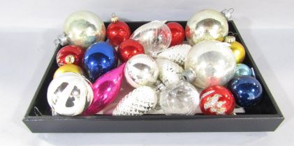 Twenty two late 20th century Christmas tree baubles in various shapes and sizes.
