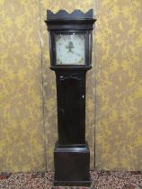 A Georgian oak country made cottage longcase clock with square painted dial, central panel showing a