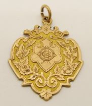 Aesthetic Movement 9ct medal fob, maker William Hair Haseler, Birmingham 1898, 11g