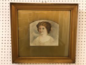 Victorian quarter-length portrait of a young girl, watercolour and bodycolour on paper, behind glass