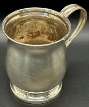 A small christening tankard 9 cm high, Sheffield 1936, maker Atkin Brothers, 4.6 ozs approximately