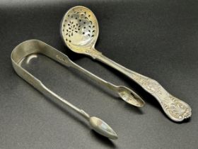 A selection of 19th century silver flatware from serving spoons, teaspoons, sugar shifting spoons,