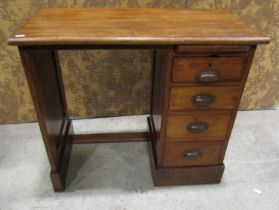 A small mahogany kneehole desk with slide, 80cm x 45cm, 69cm high.