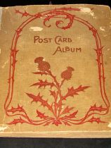 Edwardian postcard album containing topographical views, etc, together with The Improved Postage