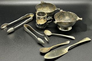 A mixed selection of silver and silver plate including two silver three-handled small bowls and a