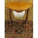 Victorian walnut and burr walnut ladies sewing table, the top with shaped outline, raised on a