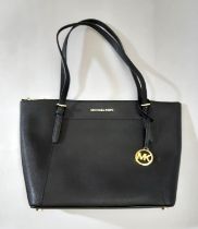 Michael Kors top zip Tote bag in black leather; interior has zipped compartment and 2 open