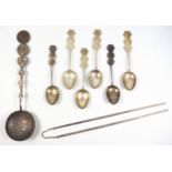 Chinese white metal ladle with a tapering "coin" handle, and 6 small spoons, each with a coin