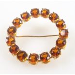 Yellow metal circular scarf brooch set topaz, stamped "750", Dia.3.6cm, gross 7grs