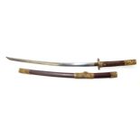 Japanese Samurai sword with a 70.5cm curved blade with a stained wood hilt in a stained wood
