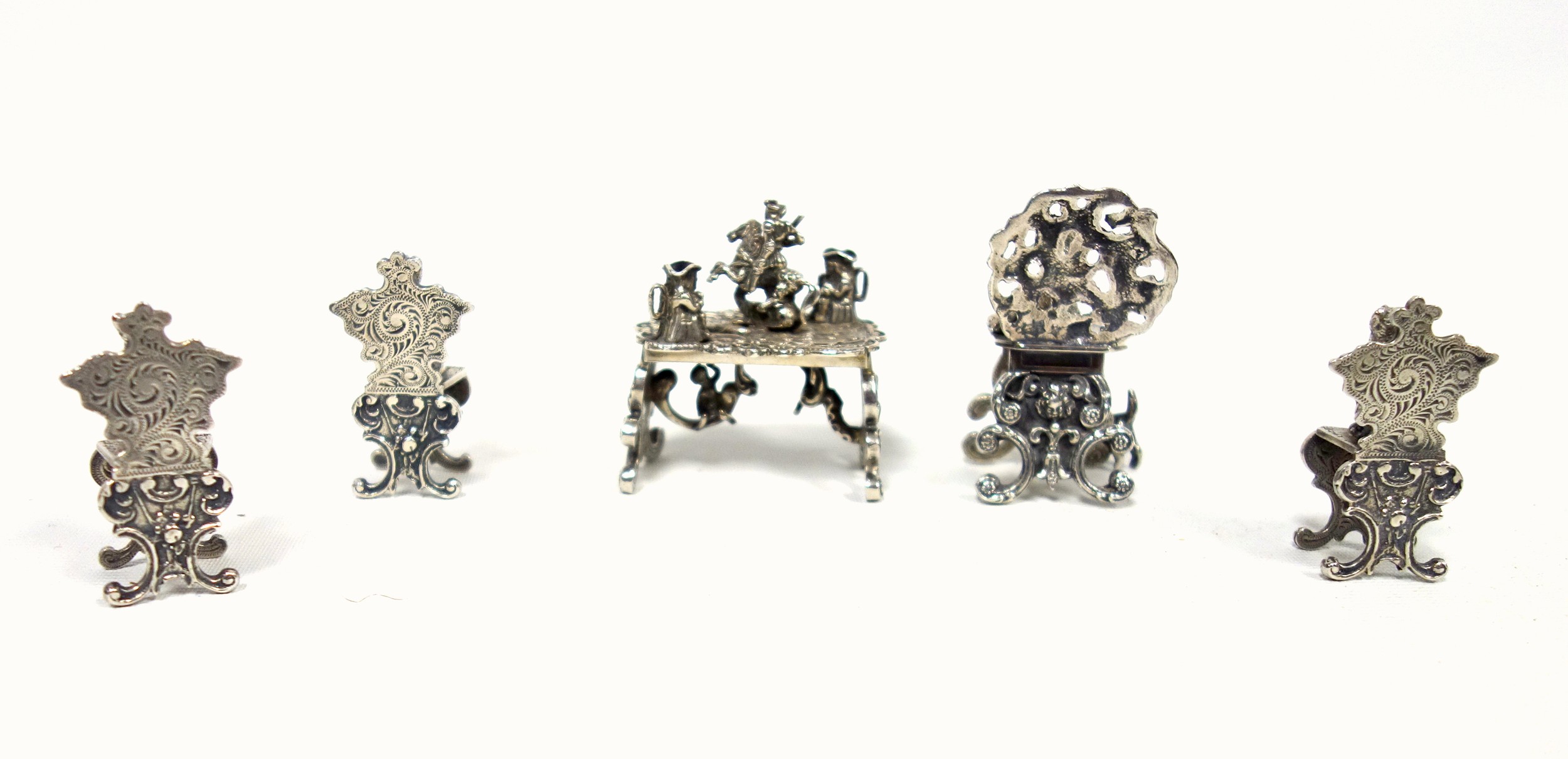 Continental miniature metal group of a chair with 2 cats and a fish, H.6.1cm; 3 similar smaller