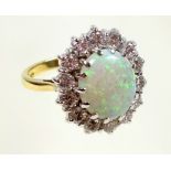 18ct gold and platinum cluster ring, set opal and diamonds (1.4cts), by sponsers H C Ltd, London
