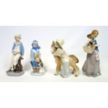Lladro figure "Little Dogs on Hip", No.1311, depicting a girl holding a basket of 3 puppies, H.25cm;