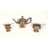 George V silver 3 piece bachelor's tea set, comprising teapot, jug and twin handled sugar bowl,