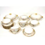 Limoges porcelain part dinner service of 36 pieces with floral and gilt decoration, by Raynaud et