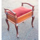 Late Victorian mahogany piano stool with a hinged red velvet upholstered seat on cabriole legs, 63 x