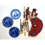 Set of Scottish rosewood, plastic, and tartan bagpipes, and 3 Burns plates. (a lot)