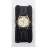 Lady's Freeson 9ct gold wrist watch with a circular white enamelled dial, seconds dial, Arabic
