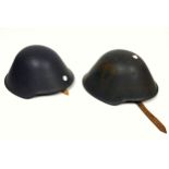 2 Military steel helmets, possibly Russian, W.30.8cm. (2)