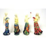 4 Old Tupton Ware figures of women in floral dresses, "Lily", "Iris", "Poinsettia", and "Poppy",