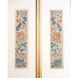 Pair of Chinese silk embroidery panels depicting moths, peonies, and cherry blossoms, on a golden