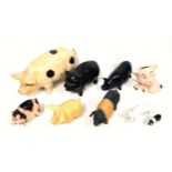 Price and other figures of pigs, largest W.28cm. (9)