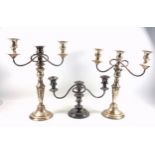 2 silver plated 3 light candelabra, each with 2 reeded scroll branches, on a tapering column,